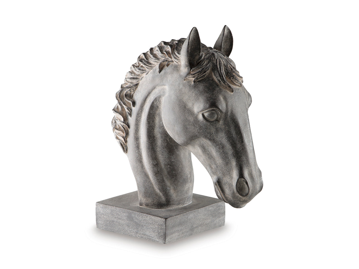 Grey horse head sculpture with curled mane, side view, on rectangular stone pedestal