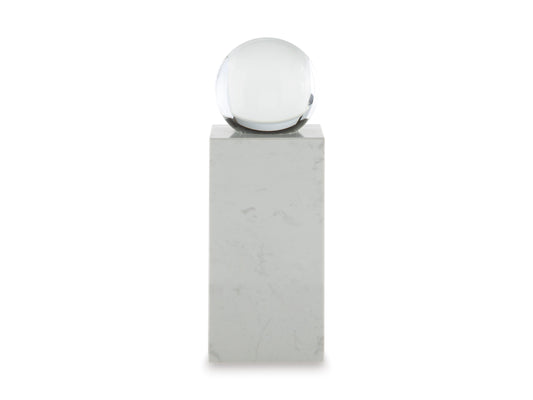 Marble pedestal sculpture with glass sphere, simple front view