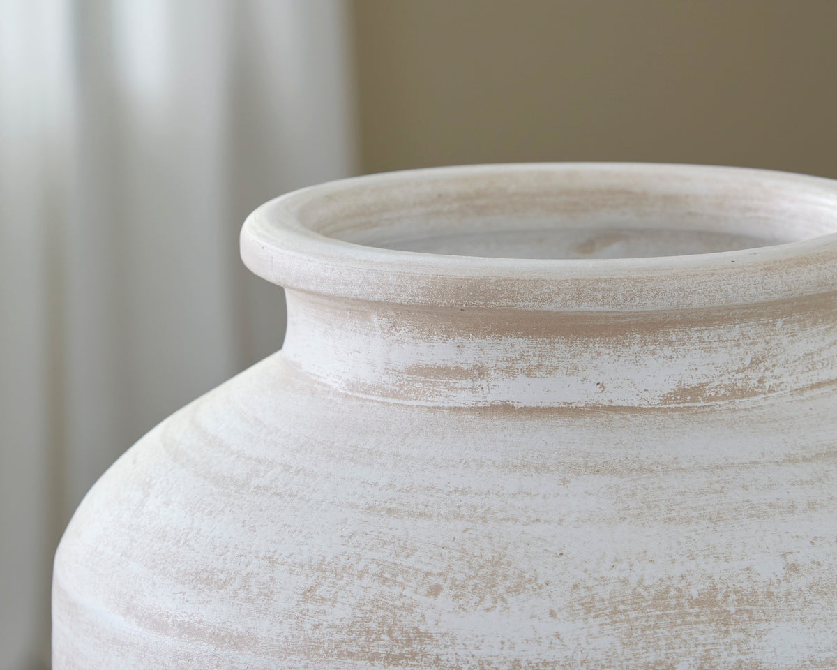 White ceramic vase rim close-up with wide mouth and textured finish