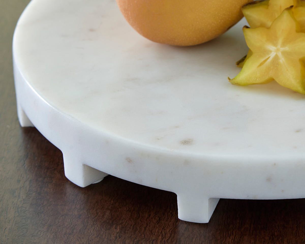 Round white serving tray edge with raised scalloped feet