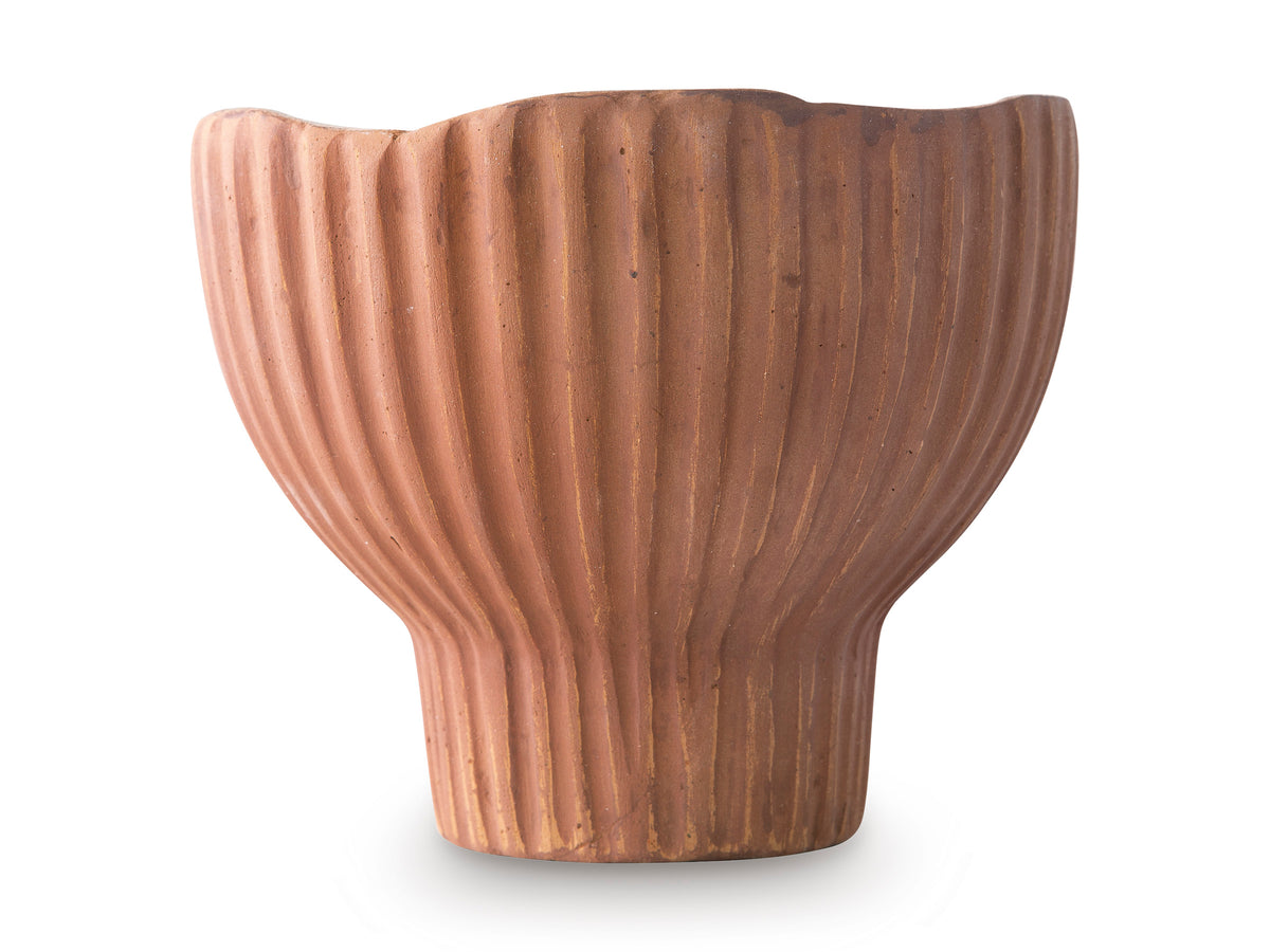 Ribbed terracotta vase with fluted vertical texture