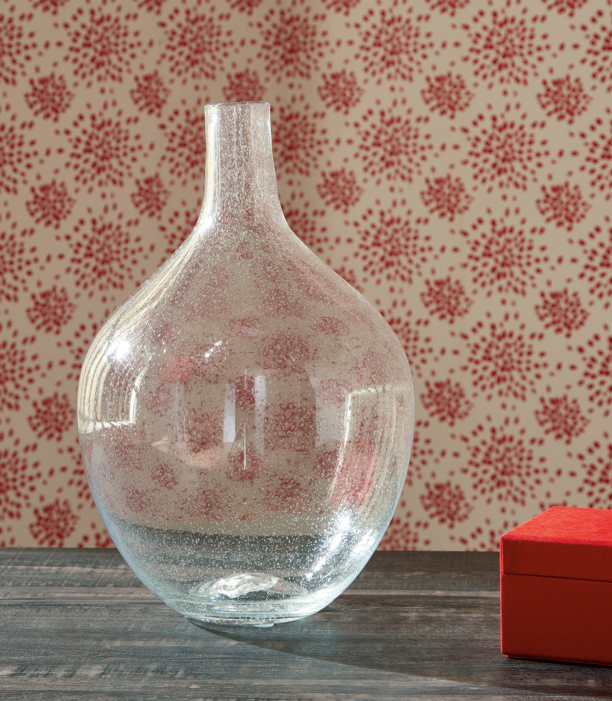 Large speckled clear glass vase with narrow neck and rounded body