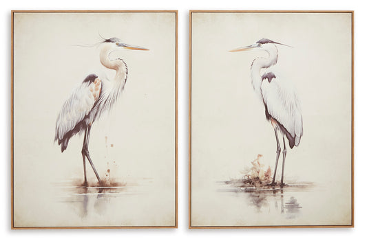 Pair of framed heron wall art prints with shallow-water reflections, warm light wood frames