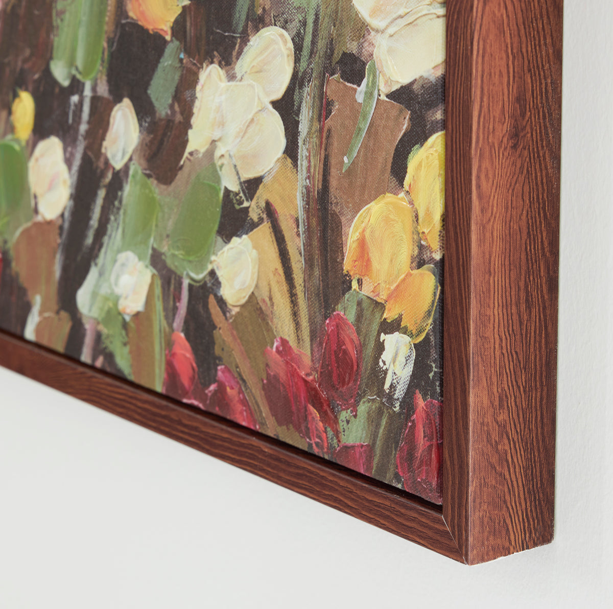 Close-up of framed painted flowers and foliage on textured canvas