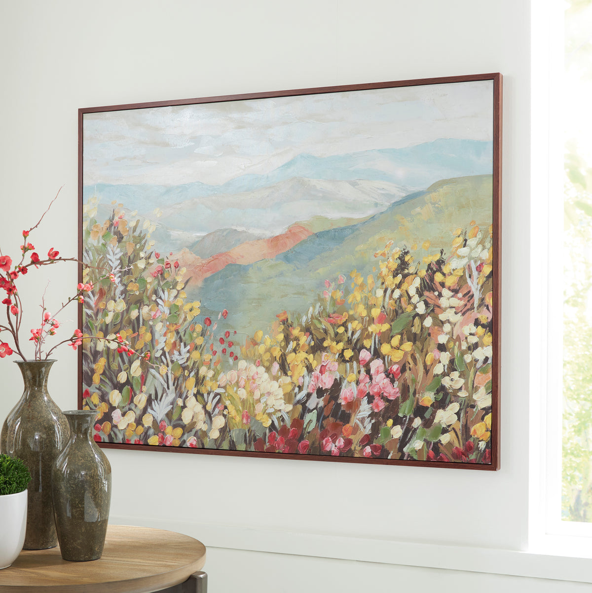 Framed landscape wall art with colorful wildflowers and mountain hills