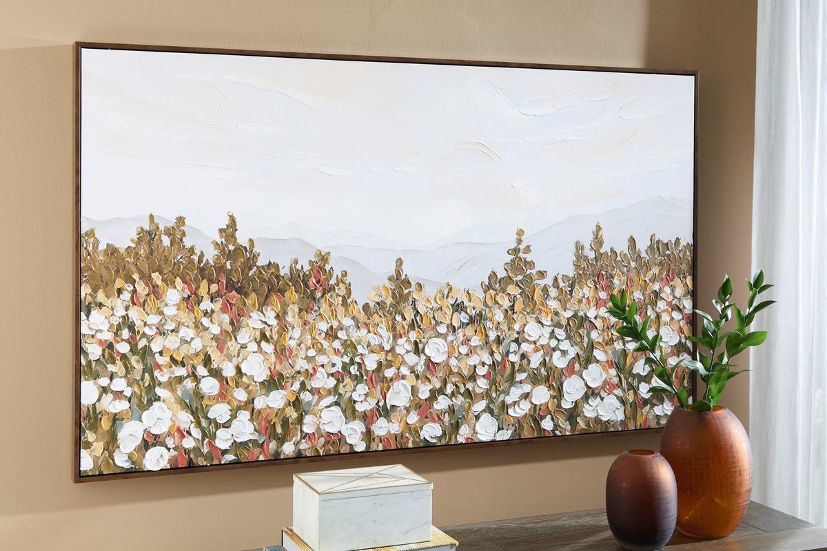Framed wall art with gold-and-white floral landscape and distant mountains
