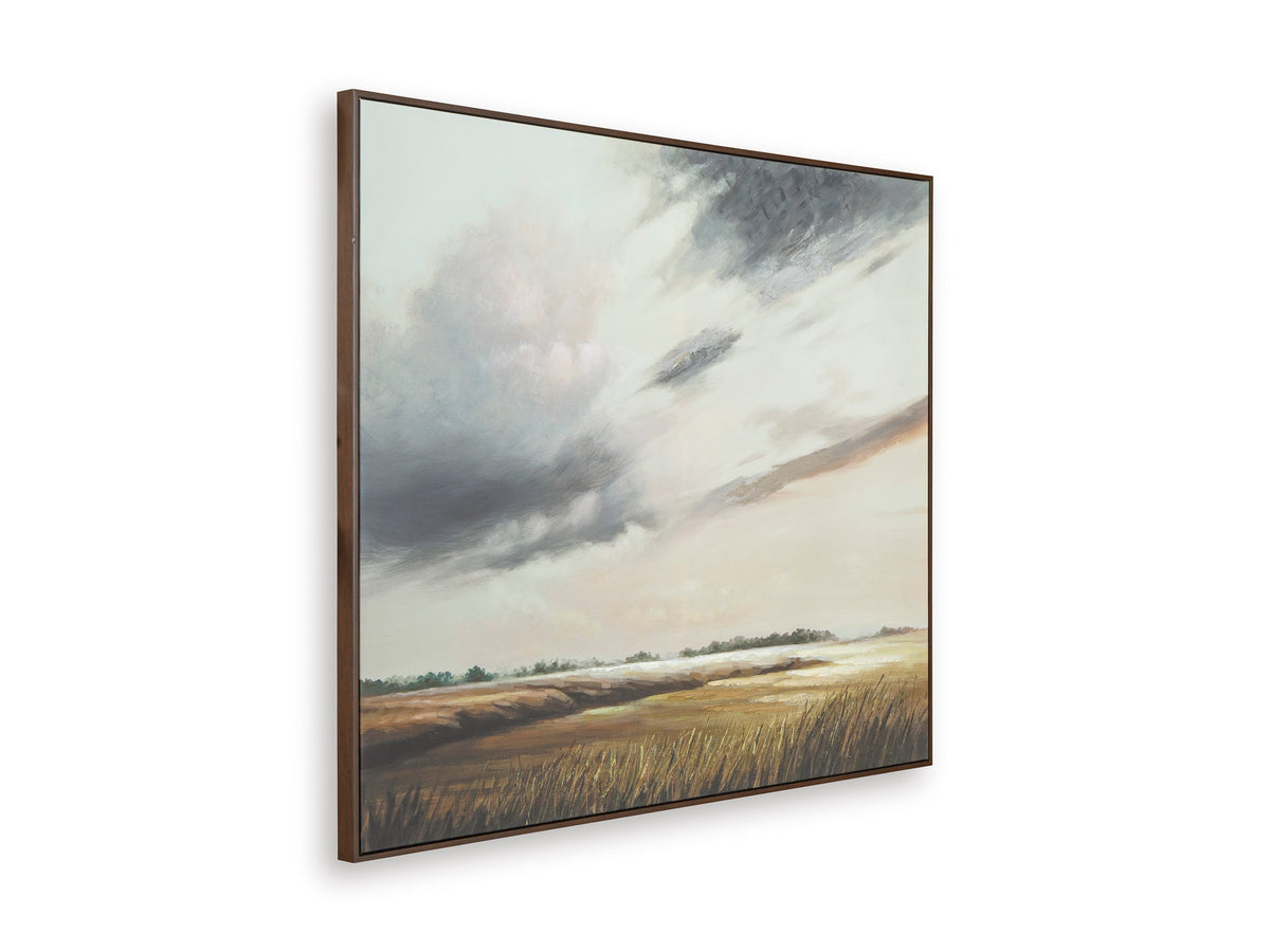Framed landscape wall art print angled view with cloudy sky and fields