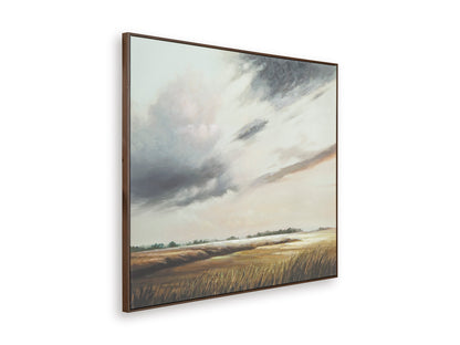 Framed landscape wall art print angled view with cloudy sky and fields