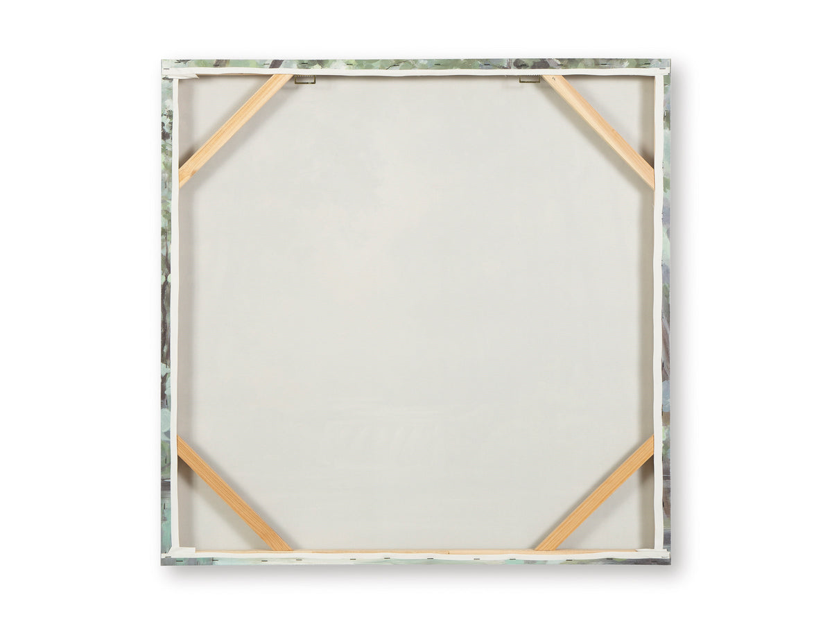 Back of framed wall art with white backing and corner support braces