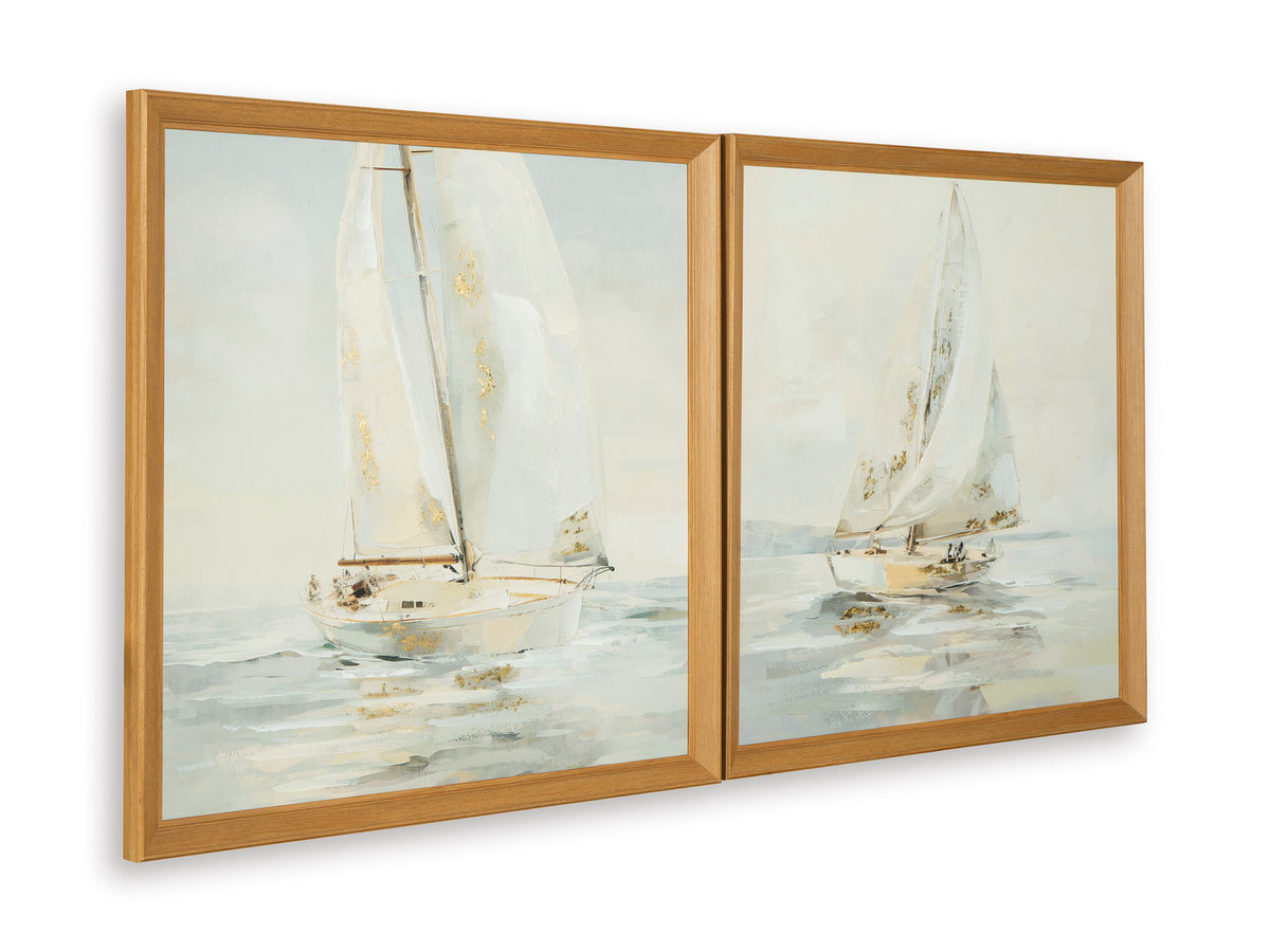 Two sailboat wall art prints in warm wood frames, side-by-side view