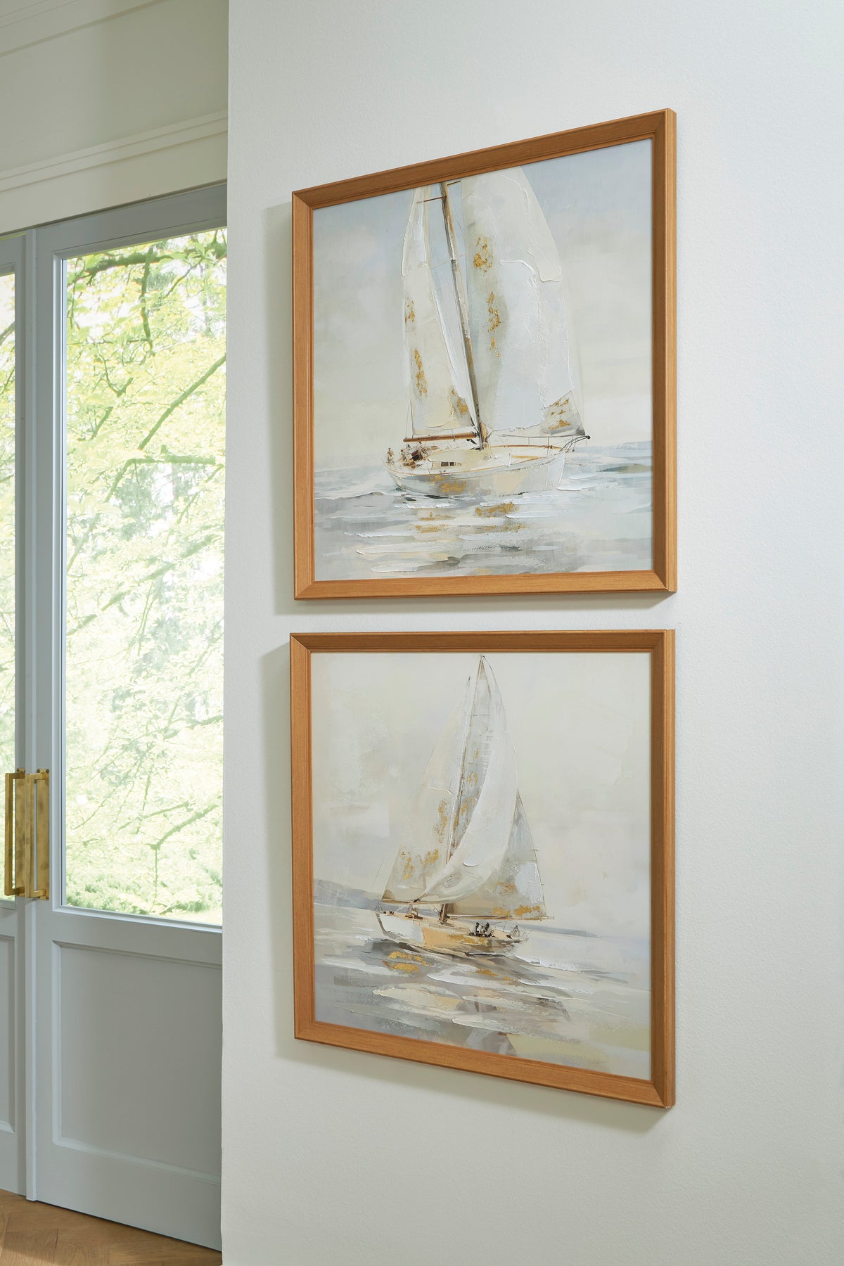 Set of 2 sailboat wall art prints with warm wood frames, abstract ocean scene