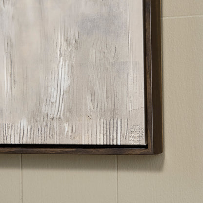Close-up of framed wall art showing textured white paint strokes and dark edges