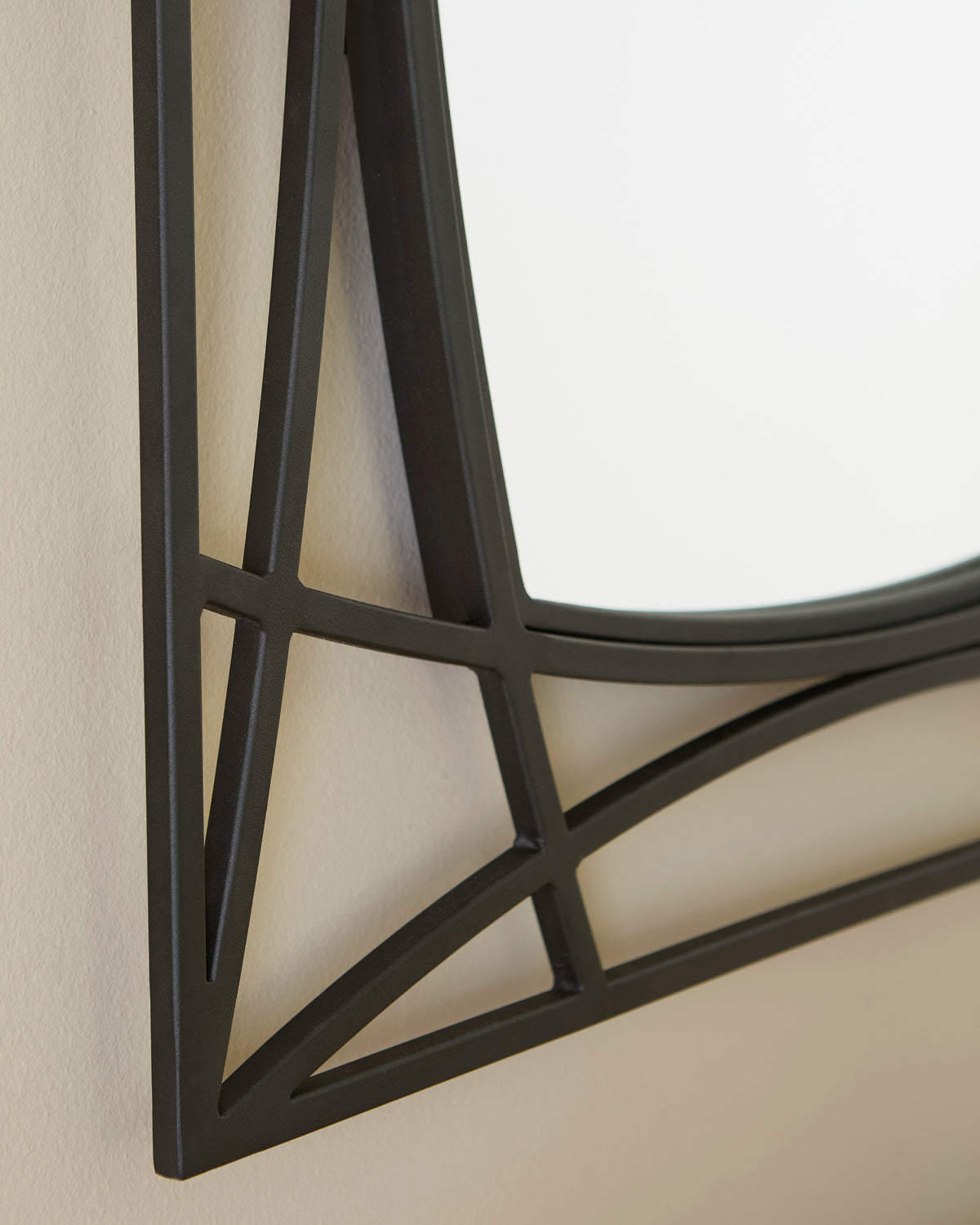 Black metal mirror frame corner with crossbar lattice pattern, side profile