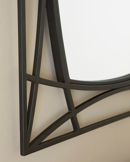 Black metal mirror frame corner with crossbar lattice pattern, side profile