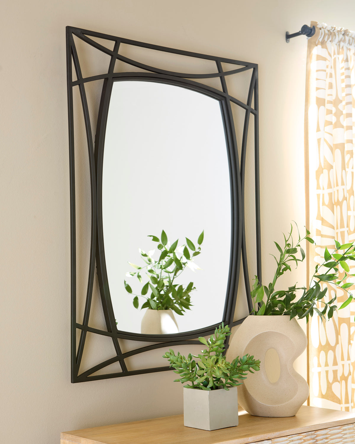 Black geometric accent mirror with arched inner frame, thin metal border