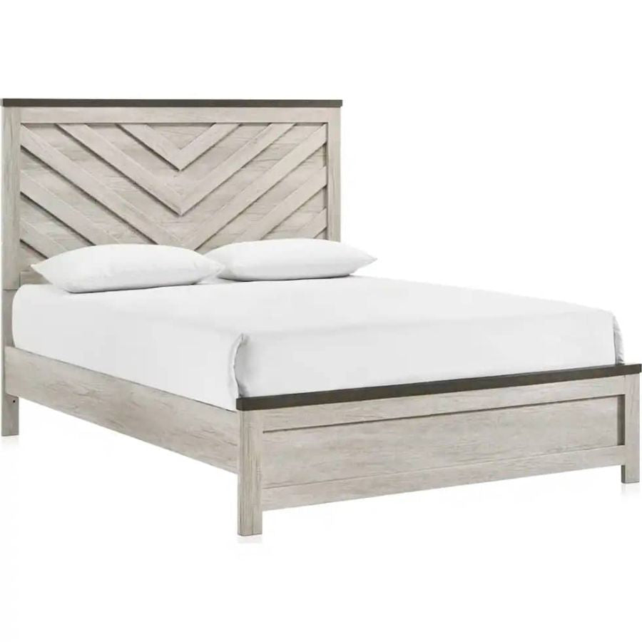 Queen bed with light gray wood frame, chevron headboard, white fitted mattress and pillows