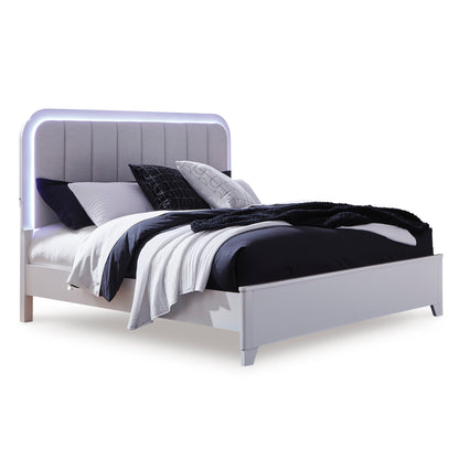 Queen upholstered panel bed with gray fabric headboard and white/black bedding