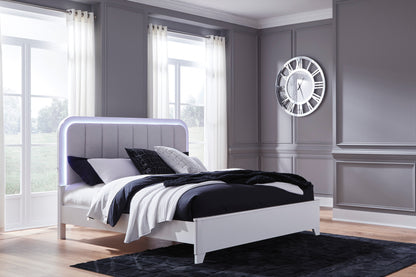 Queen upholstered panel bed, gray headboard, white and black bedding set