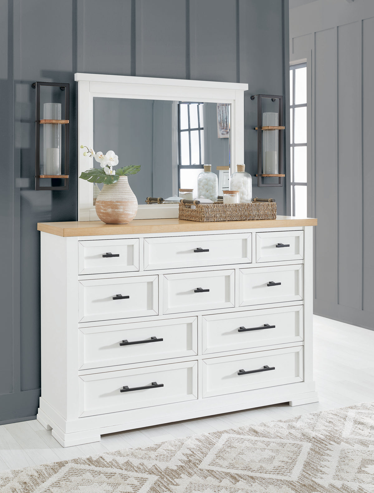 White framed bedroom mirror with rectangular reflective panel over dresser