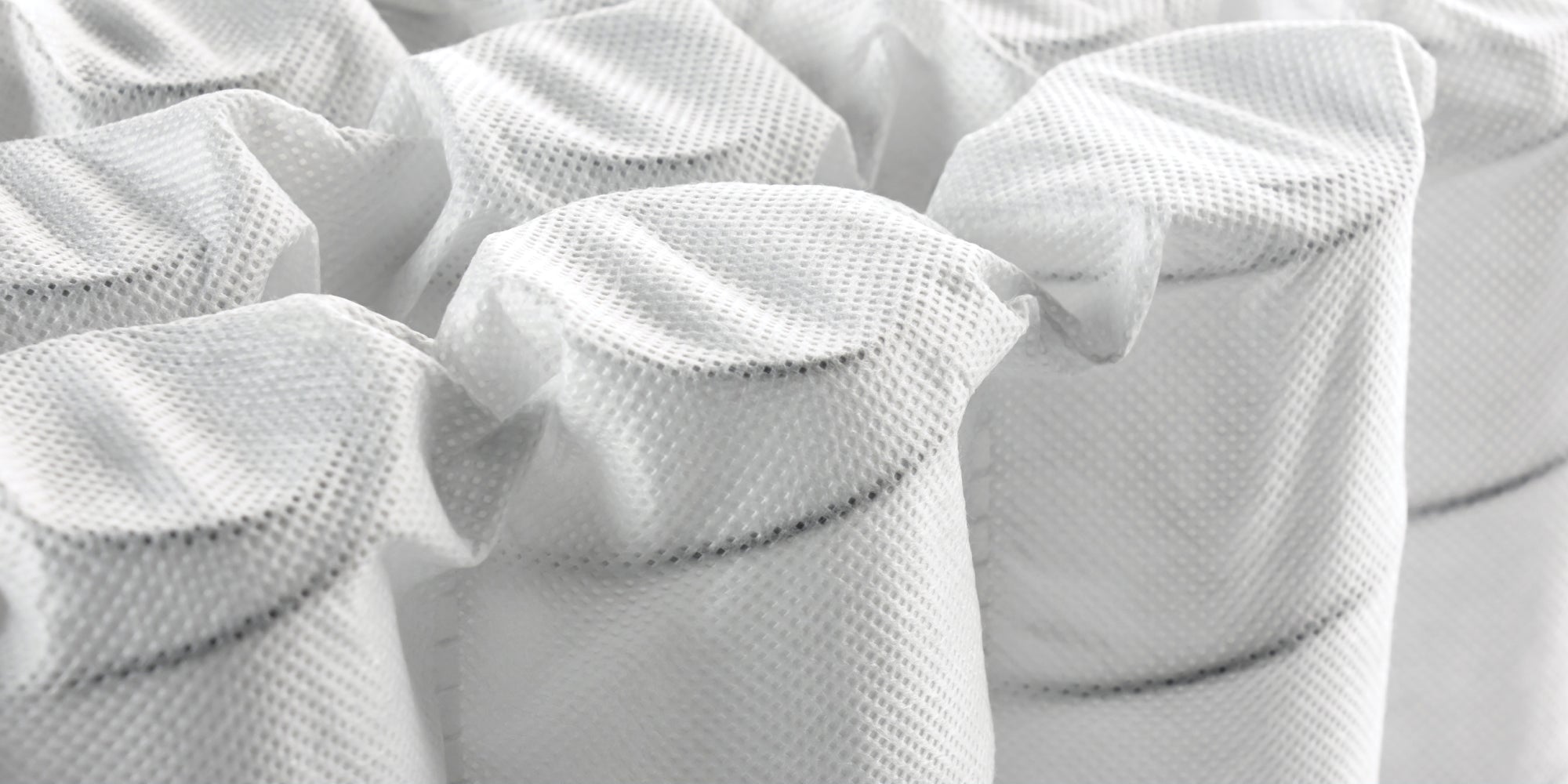 Close-up of a mattress with 875 coil density