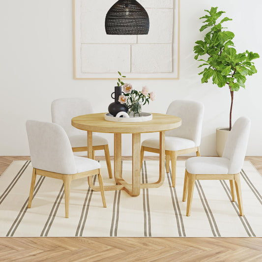 Wood dining table with four upholstered chairs, light gray fabric