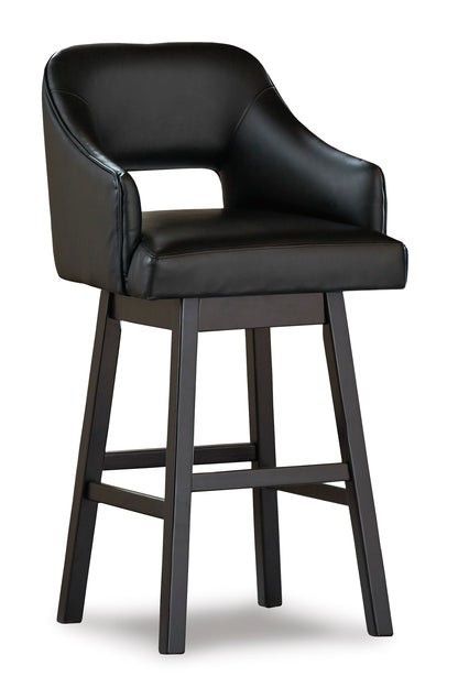Black bar height bar stool with padded seat and back, curved arms, and footrest