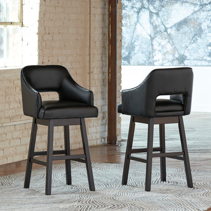 Set of 2 black bar height bar stools with padded arms, back, and footrest legs