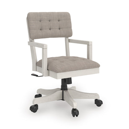Light-gray fabric office chair with tufted backrest and seat, white arms, rolling casters.