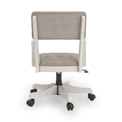 Tufted light-gray office chair back with padded seat, white frame, swivel base with casters.