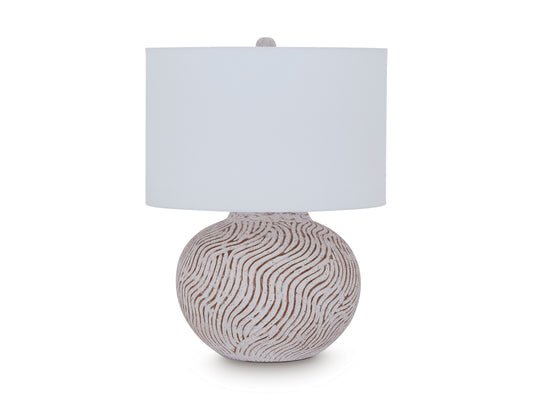 Table lamp with white drum shade and round swirled ceramic base
