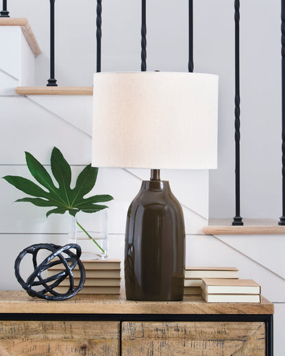 Table lamp with off-white fabric shade and dark brown ceramic base