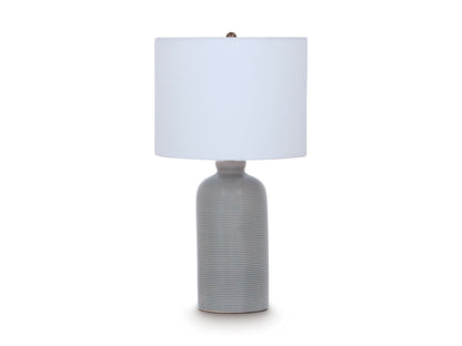 Ceramic table lamp with blue-and-white ribbed base and white drum shade