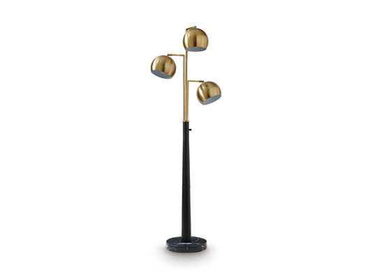 Standing metal floor lamp with black pole and three gold dome shades