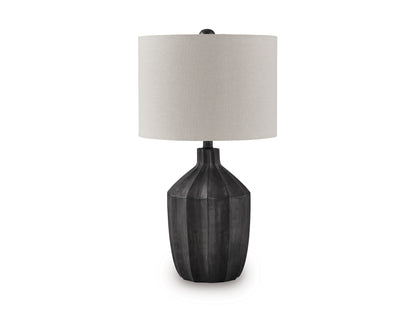 Poly table lamp with beige drum shade and dark gray ribbed sculpted base