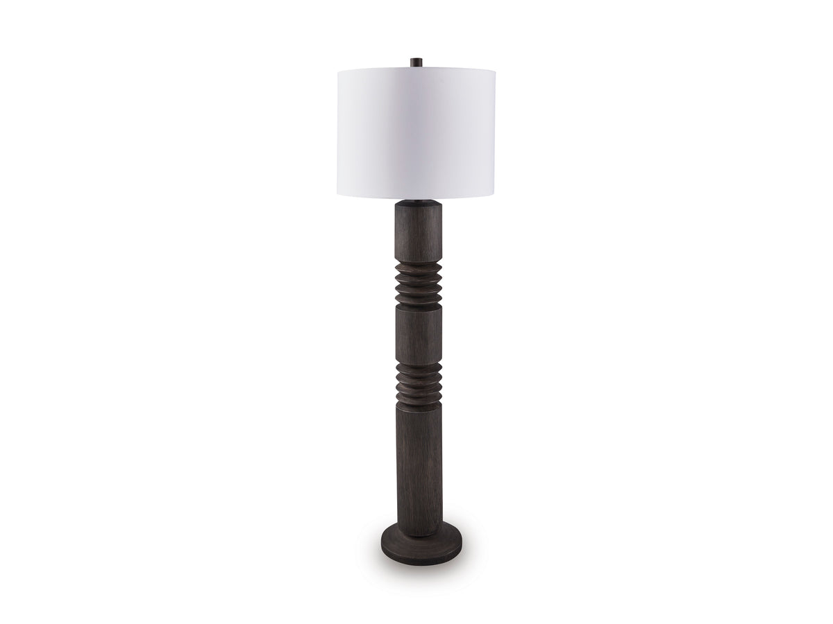 Tall dark poly floor lamp with white drum shade and stacked tapered column base