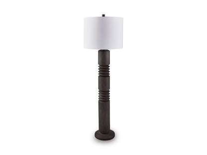 Tall dark poly floor lamp with white drum shade and stacked tapered column base