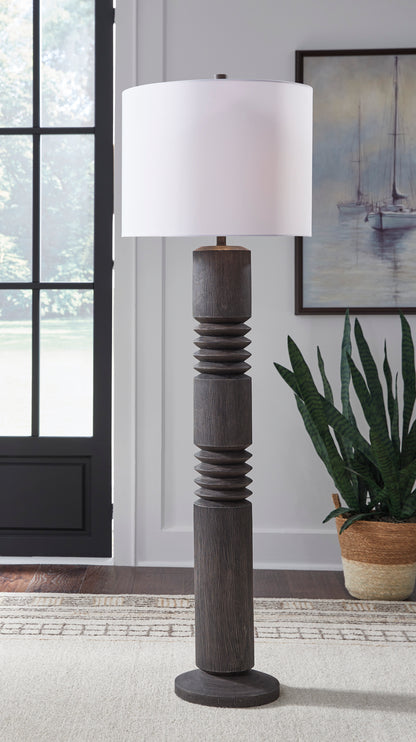 Dark textured poly floor lamp with stacked column base and white fabric drum shade