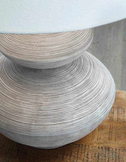 Gray stone-textured lamp base with stacked rounded tiers and spiral grooves
