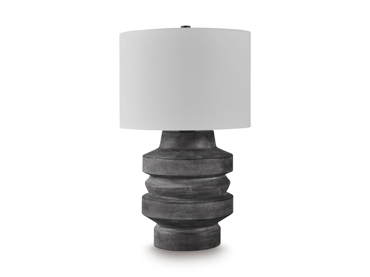 Table lamp with white drum shade and dark gray ribbed sculpted base