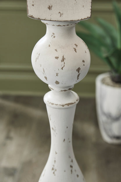 Close-up of white distressed lamp column base with small finial and upper stem