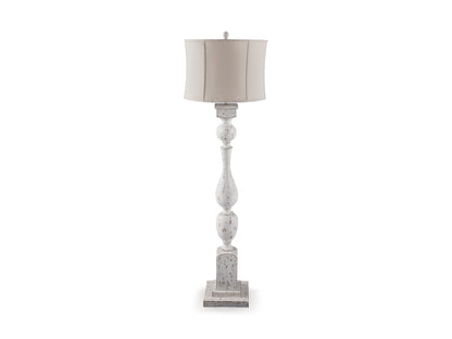 White floor lamp with beige drum shade and stacked turned pedestal base