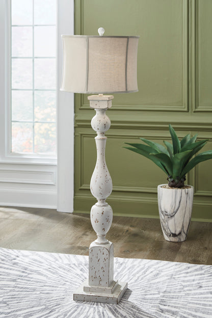 White distressed floor lamp with fabric drum shade and turned column base