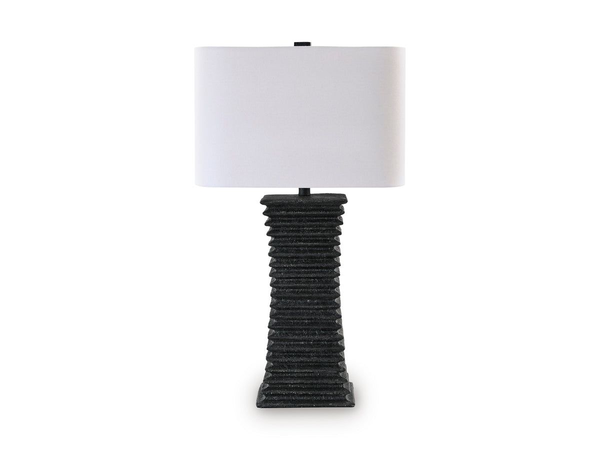 Table lamp with black ribbed base and white drum shade