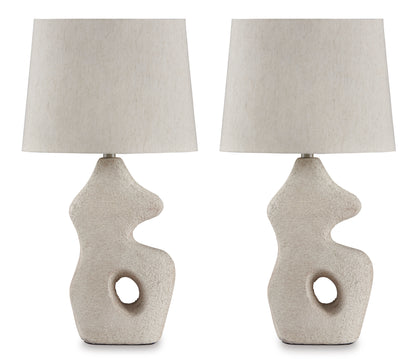 Pair of textured ceramic table lamps with off-white drum shades and round cutouts