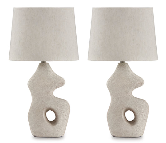 Pair of textured ceramic table lamps with off-white drum shades and round cutouts