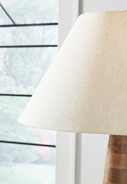 Wood floor lamp with beige fabric drum shade and carved wood column stem