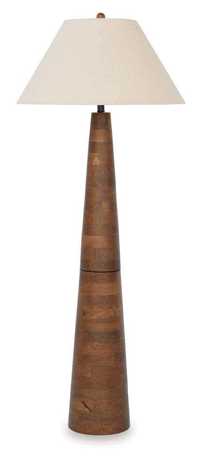 Wood floor lamp with beige fabric drum shade and tall tiered wooden column base