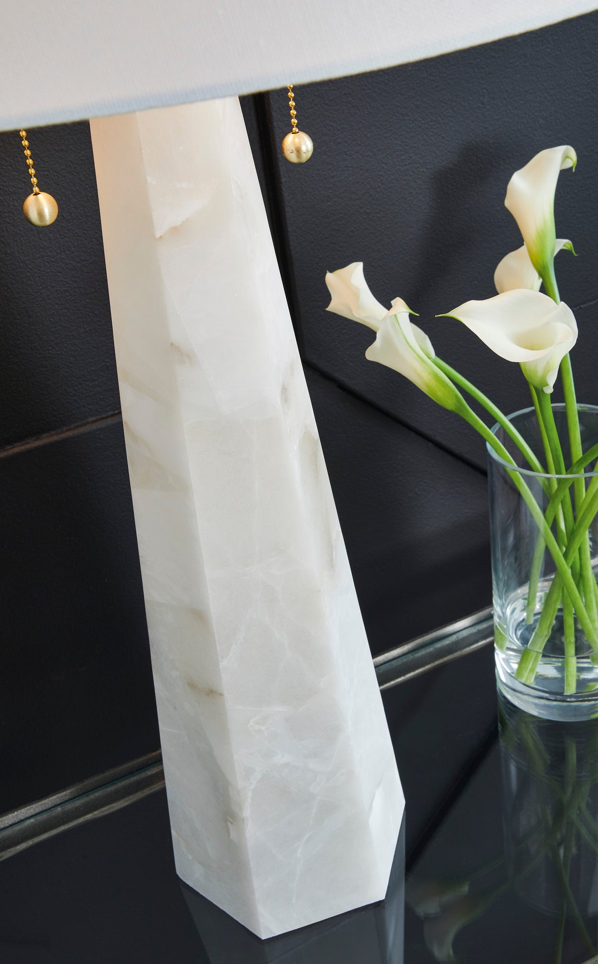 Alabaster table lamp base with white drum shade; gold pull chain details