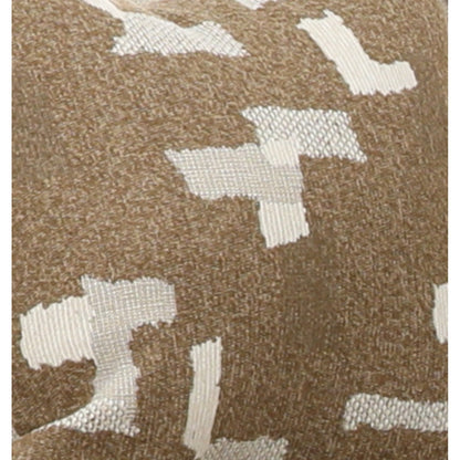 Close-up of brown and white patterned fabric with geometric block motifs