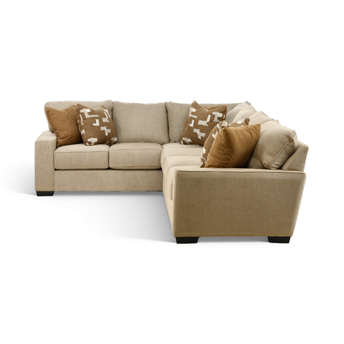 Beige sectional sofa with chaise extension and decorative pillows